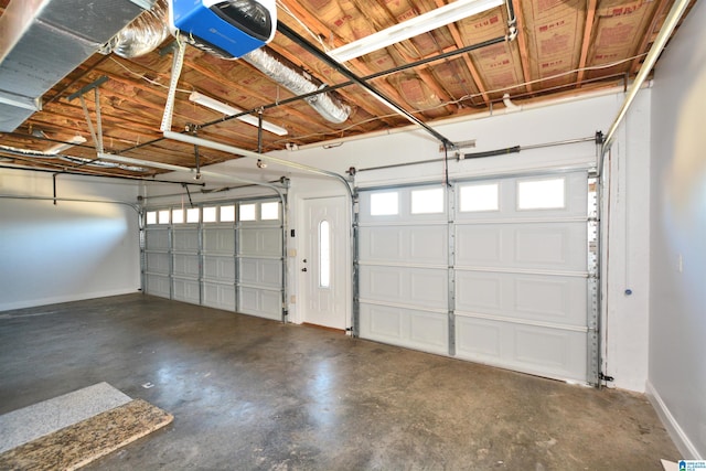 garage featuring a garage door opener