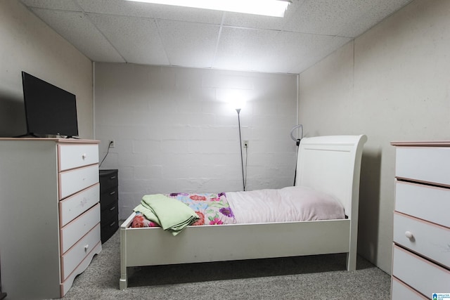 bedroom featuring a drop ceiling