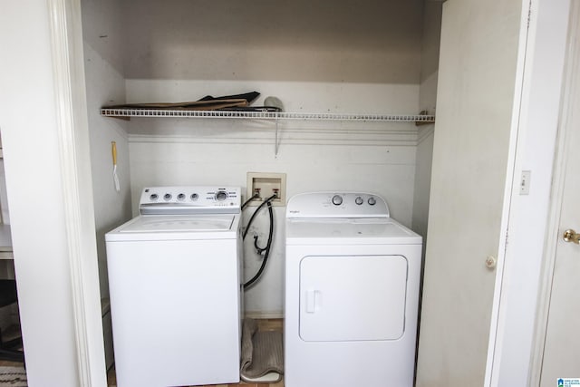 laundry room with washing machine and dryer