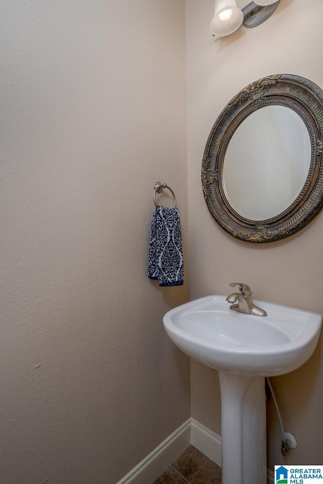 bathroom with tile patterned flooring