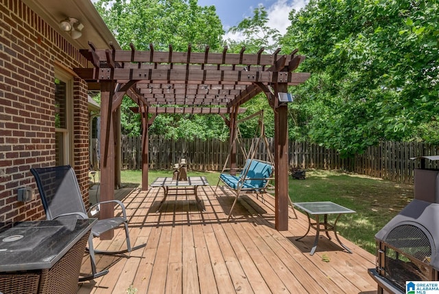 wooden deck with a pergola and a yard