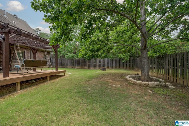 view of yard featuring a pergola and a wooden deck