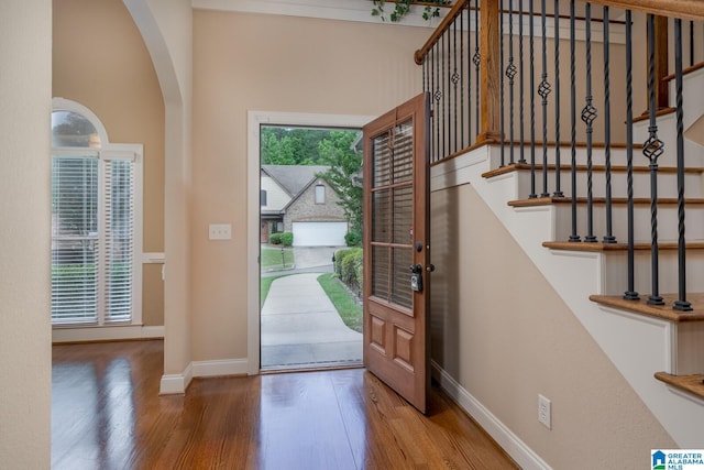 entrance foyer with hardwood / wood-style floors