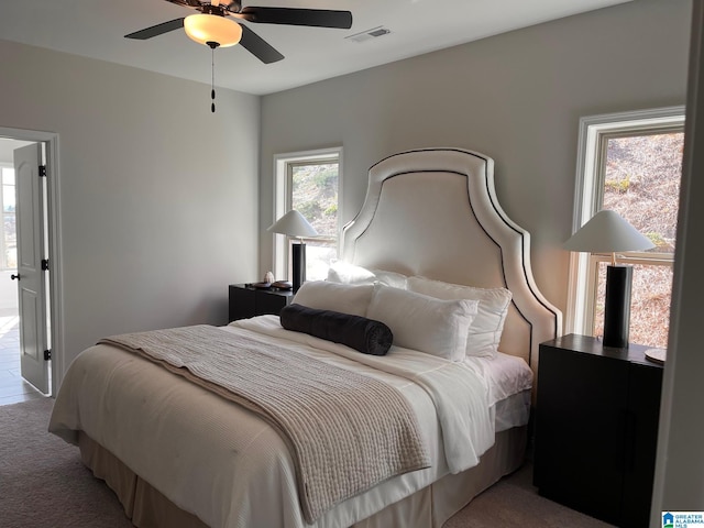 bedroom featuring carpet flooring and ceiling fan