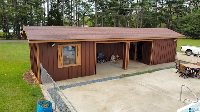 garage with a lawn