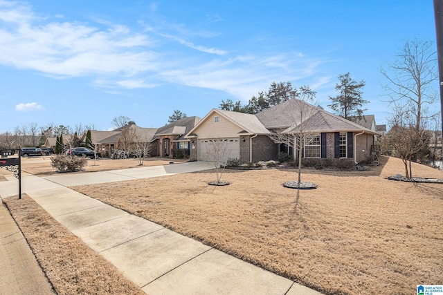 ranch-style house featuring a garage