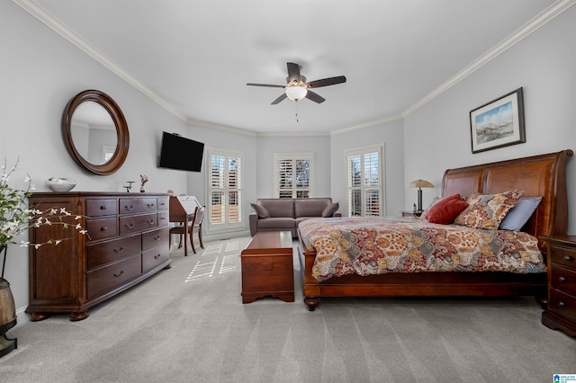 bedroom with light colored carpet, ceiling fan, and ornamental molding