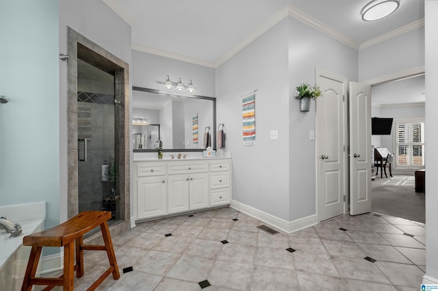 bathroom featuring tile patterned flooring, a shower with door, vanity, and ornamental molding