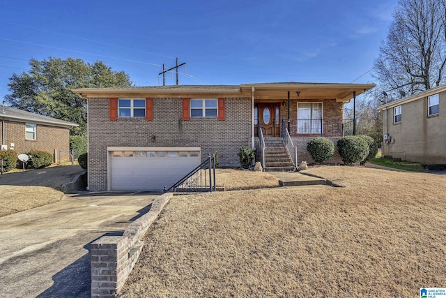 view of front of home with covered porch and a garage