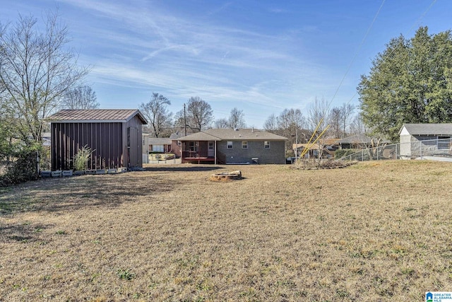 view of yard featuring a storage unit