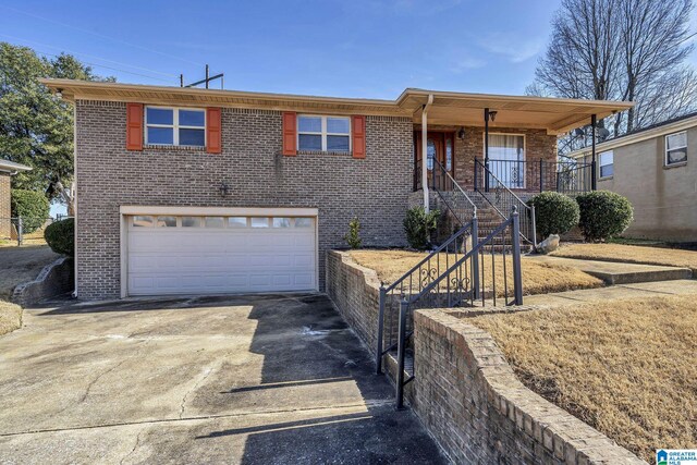 view of front of home featuring a garage