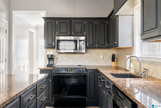 kitchen with tasteful backsplash, light stone counters, crown molding, sink, and black appliances