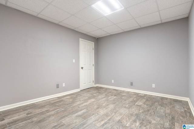 spare room featuring a drop ceiling