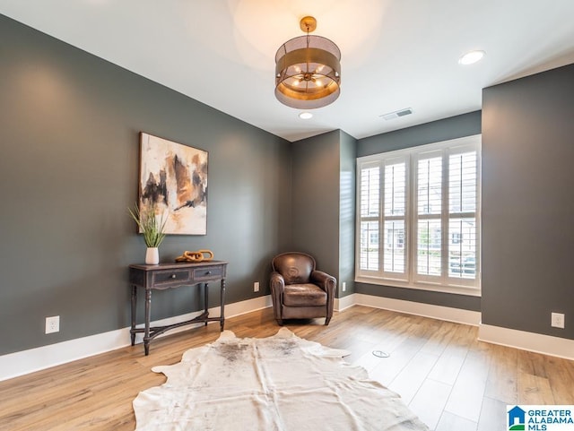 sitting room with light wood-type flooring