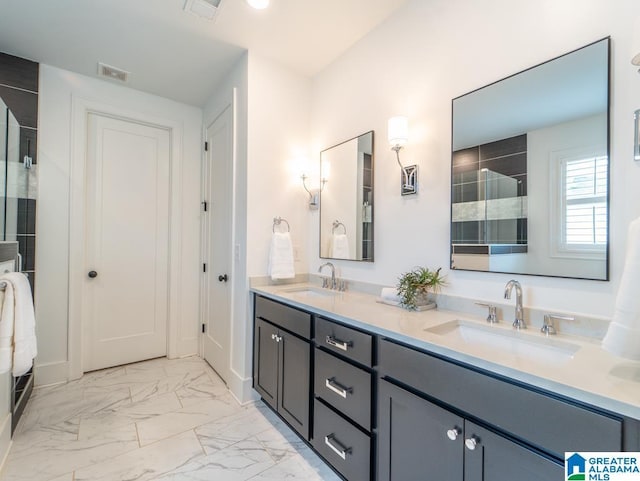 bathroom with vanity and walk in shower