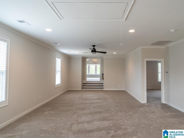 unfurnished room with ceiling fan, ornamental molding, and light carpet