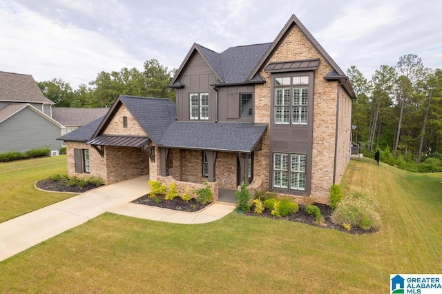 view of front facade with a front lawn and a porch