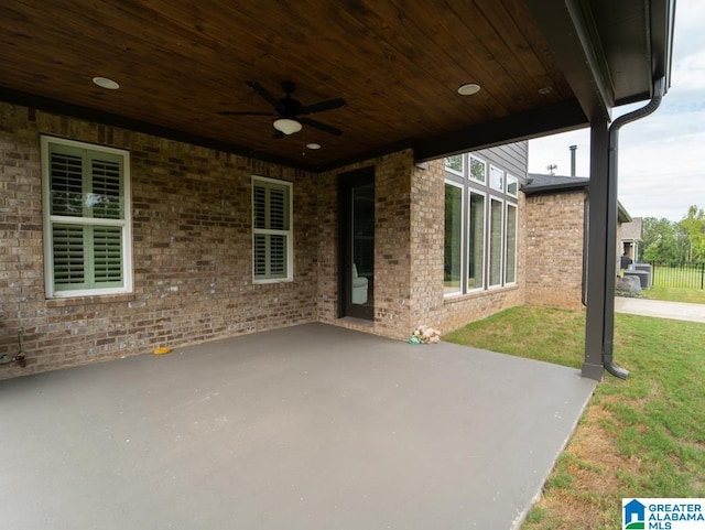 view of patio featuring ceiling fan