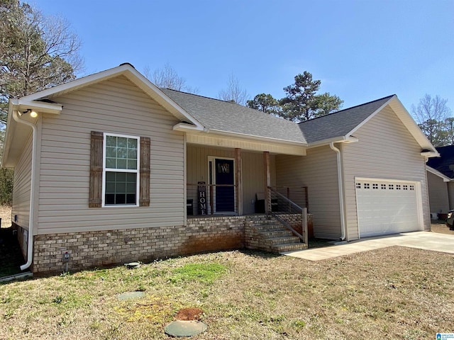 ranch-style home featuring a porch and a garage