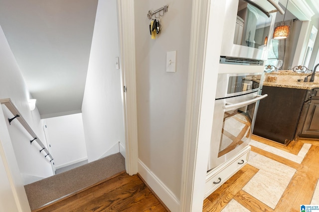 bathroom featuring wood-type flooring