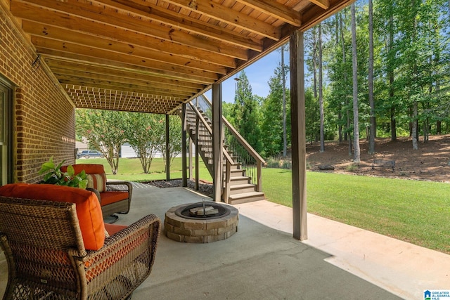 view of patio with an outdoor fire pit