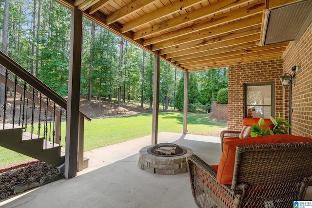 view of patio / terrace with an outdoor fire pit