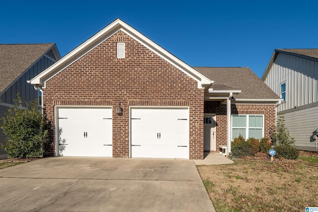 front of property with a garage