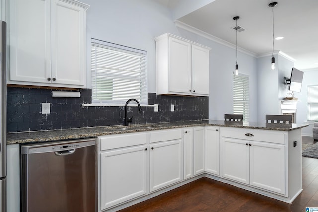 kitchen featuring kitchen peninsula, white cabinetry, dishwasher, and sink