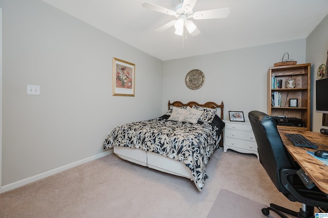 bedroom featuring ceiling fan and light colored carpet