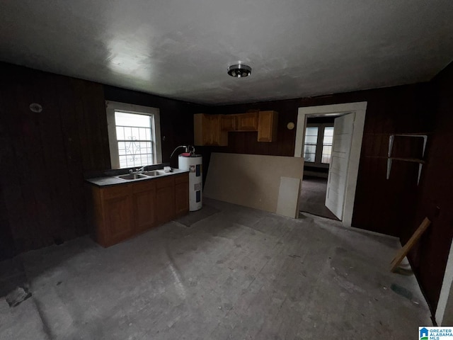 kitchen with electric water heater and sink