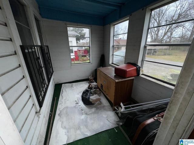 sunroom / solarium featuring plenty of natural light