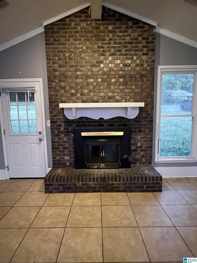 interior details featuring a brick fireplace