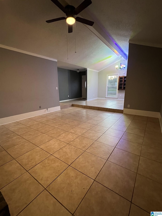 unfurnished living room featuring ornamental molding, ceiling fan with notable chandelier, a textured ceiling, lofted ceiling with beams, and light tile patterned flooring