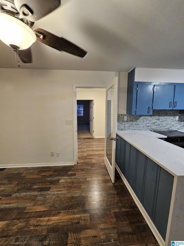 kitchen featuring french doors, dark hardwood / wood-style flooring, tasteful backsplash, and ceiling fan