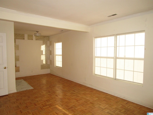 unfurnished room with parquet floors and ornamental molding