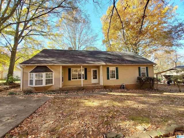 ranch-style house with a porch