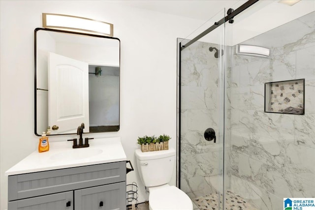 bathroom with vanity, toilet, and an enclosed shower