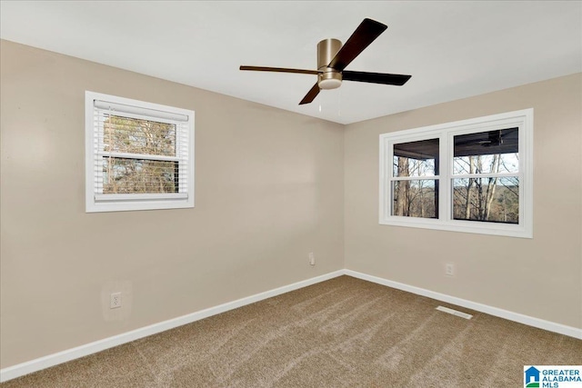 unfurnished room featuring carpet flooring and ceiling fan