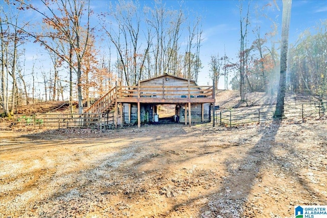 view of outdoor structure featuring a rural view