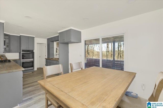 dining room featuring wood-type flooring