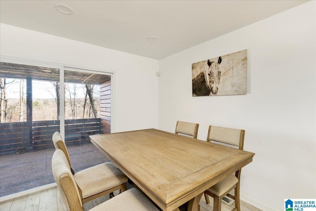 dining room with light hardwood / wood-style flooring