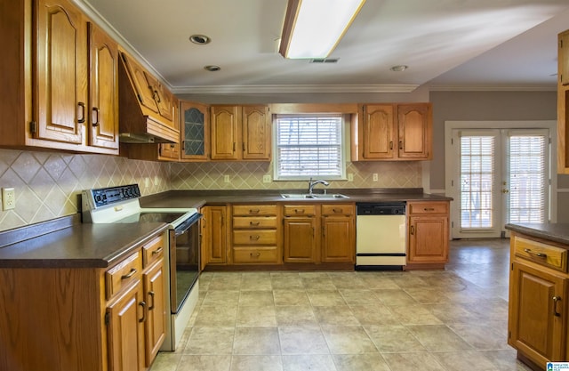 kitchen featuring white dishwasher, crown molding, sink, electric range, and a healthy amount of sunlight