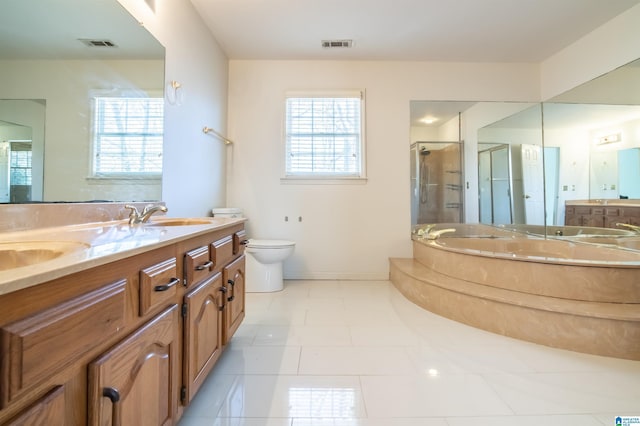 full bathroom with separate shower and tub, tile patterned flooring, vanity, and toilet