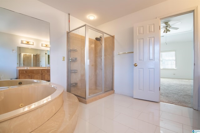 bathroom with tile patterned flooring, vanity, ceiling fan, and independent shower and bath