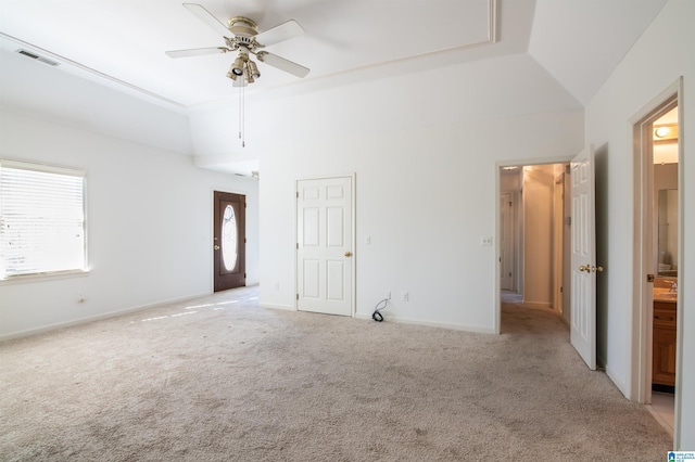 interior space with ceiling fan and lofted ceiling