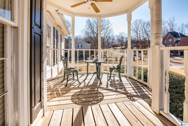 exterior space featuring ceiling fan and a porch