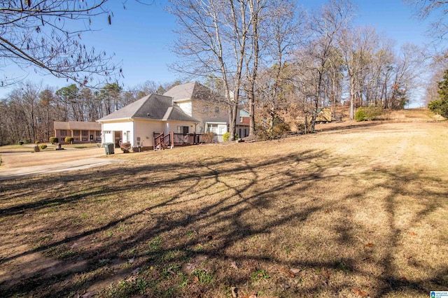 view of yard featuring a deck