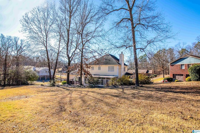 view of yard featuring a garage