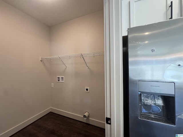 washroom featuring hookup for an electric dryer, dark hardwood / wood-style flooring, and hookup for a washing machine