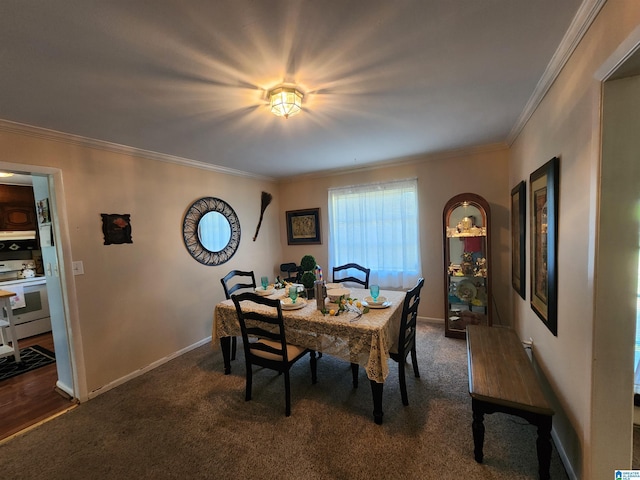 carpeted dining space featuring crown molding